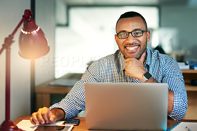 Buy stock photo Laptop, portrait and smile with designer man in office at night for administration or online project. Computer, glasses and web development with person in creative workplace for late evening work