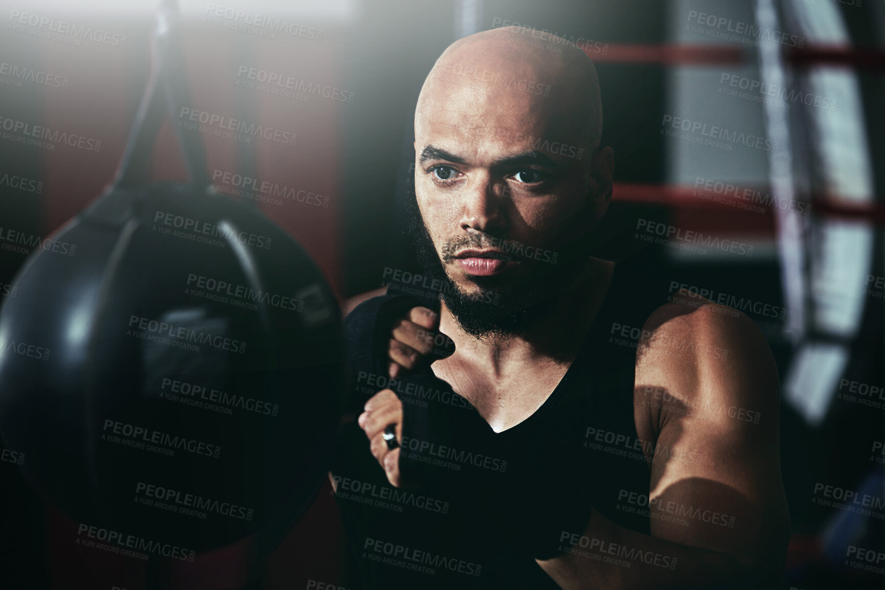 Buy stock photo Fitness, punching and man in gym for exercise, boxing challenge or competition training. Power, muscle and fist of champion boxer at workout with confidence, fight and energy in MMA sports club.