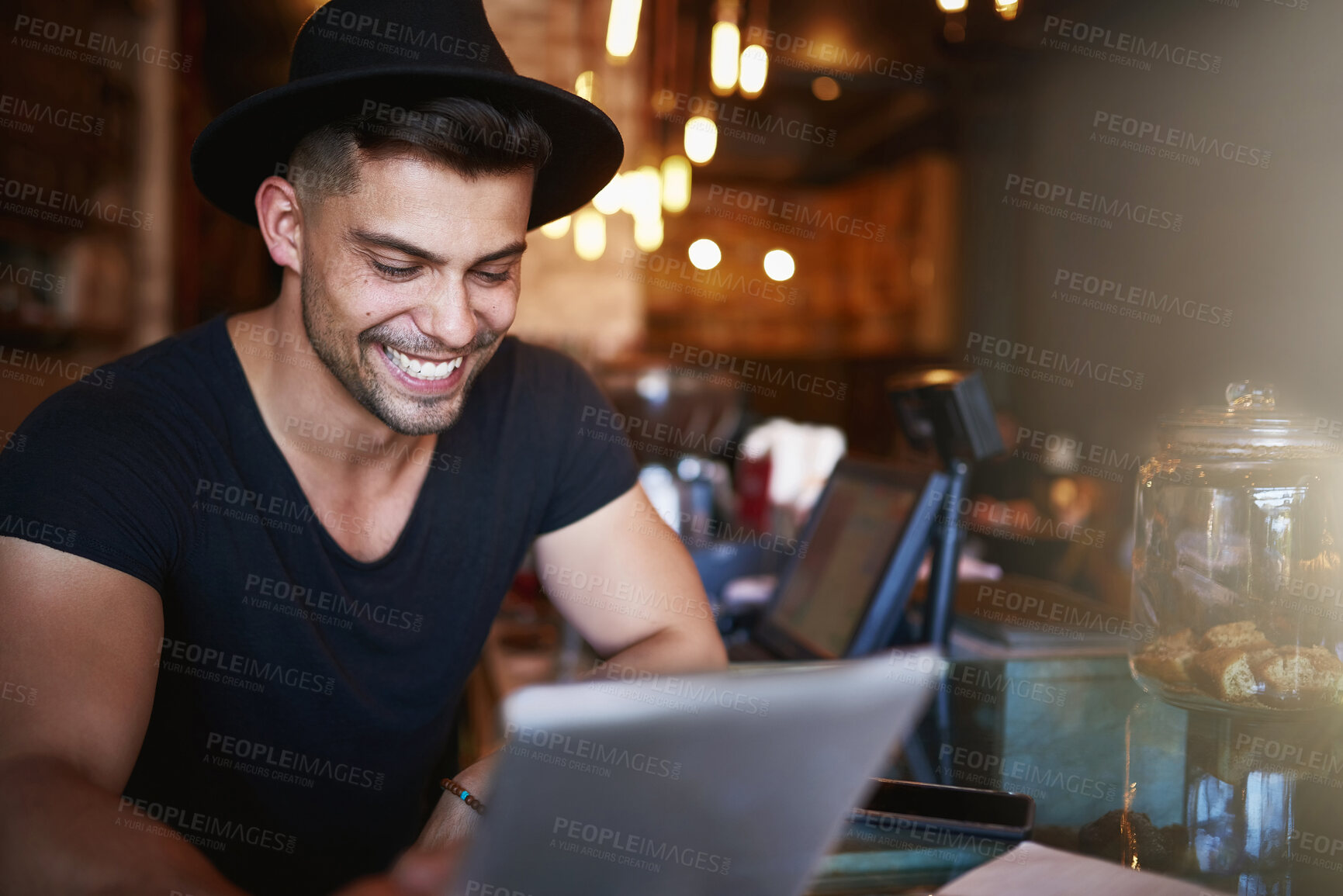 Buy stock photo Happy, coffee shop and man in cafe with laptop for small business, working online and customer service. Restaurant, hospitality and waiter by counter with computer for serving, help and inventory