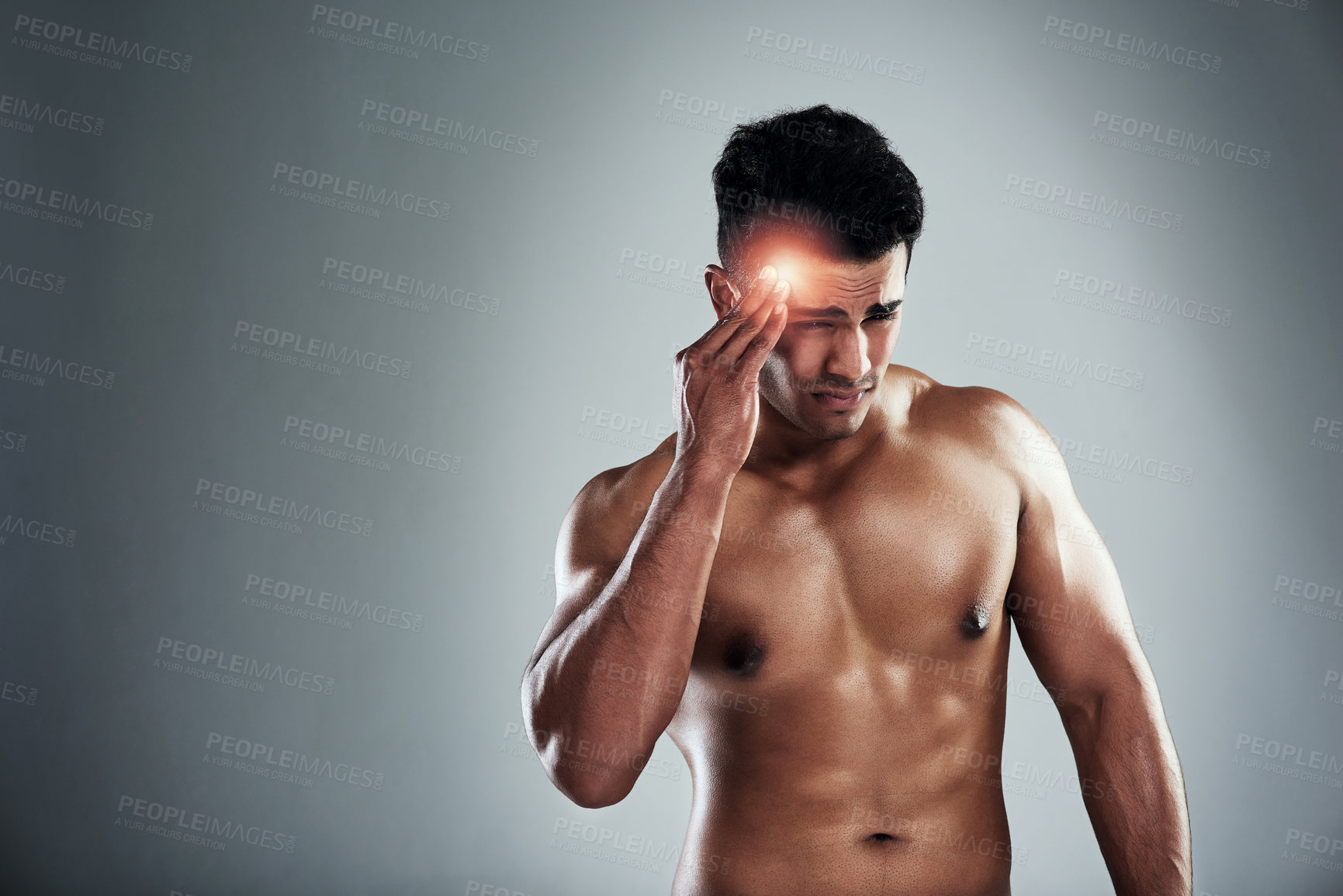 Buy stock photo Man, bodybuilder and headache in studio with space for mockup, fatigue and training for health by white background. Person, migraine and red glow for pain, tired and burnout from workout for fitness