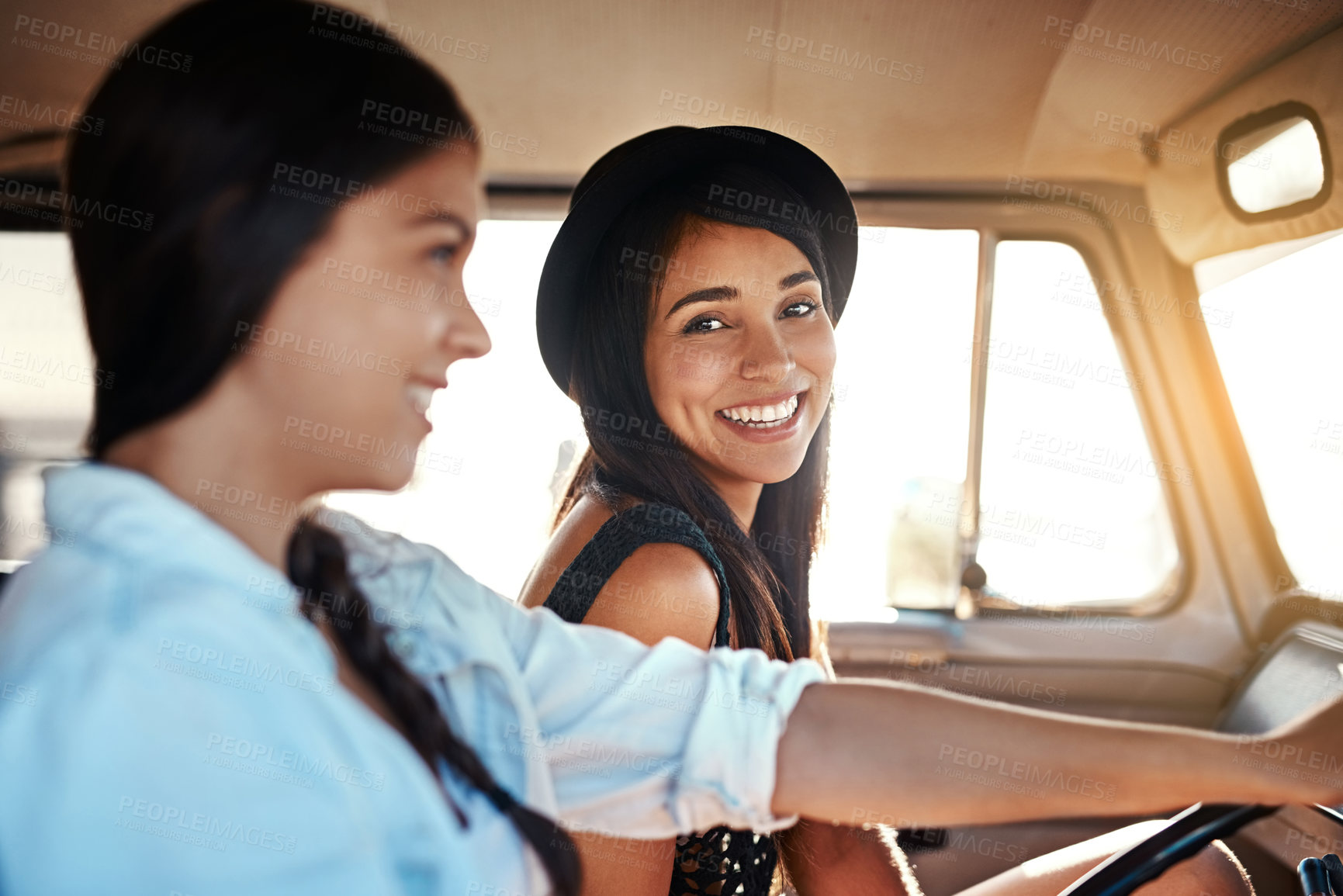 Buy stock photo Portrait, happy and girl friends on road trip in van at sunset in countryside for holiday adventure. Smile, driving and women in vehicle for bonding, explore and travel together on vacation in Mexico