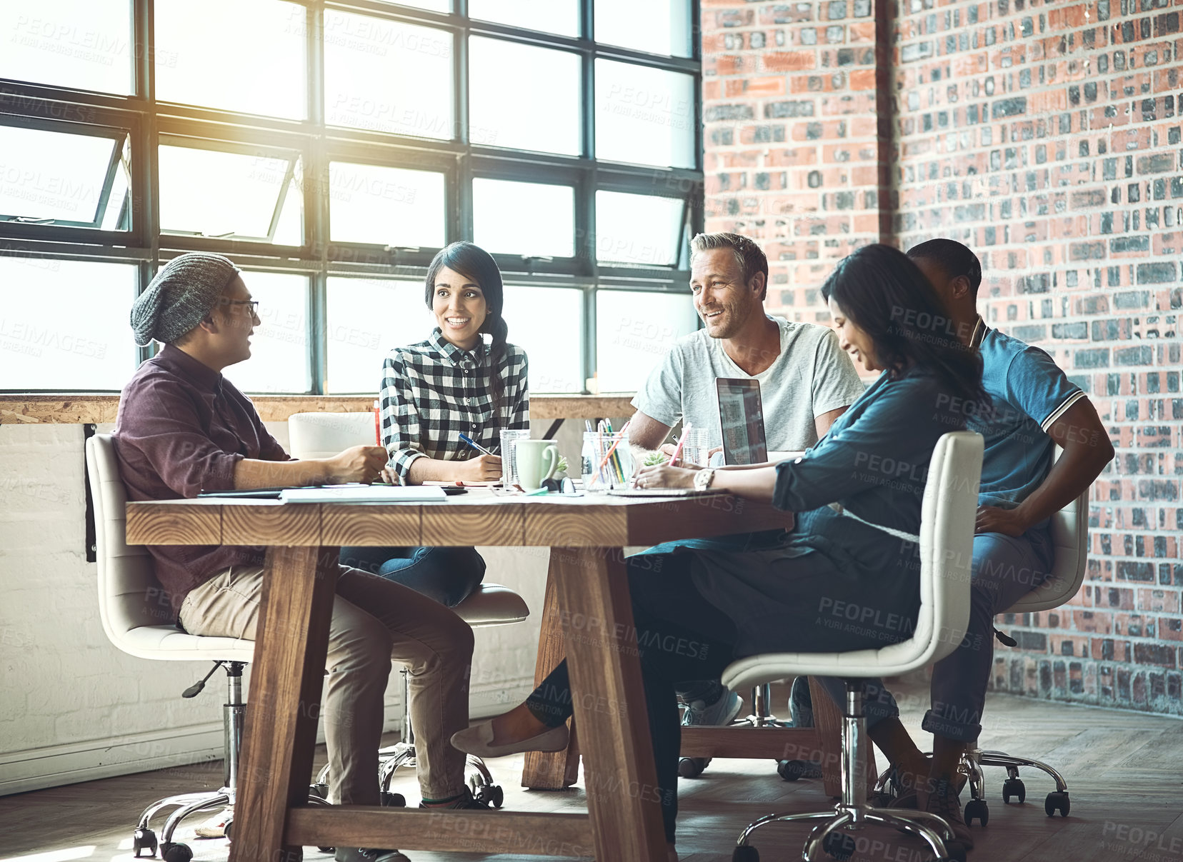 Buy stock photo Business people, discussion and meeting with team for collaboration, planning or brainstorming at office. Group of creative employees discussing project, ideas or strategy for startup at workplace