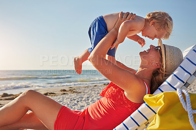 Buy stock photo Woman, lifting and child by beach with love on holiday, vacation in Istanbul for happiness or memory. Excited, mom and kid for relax, together and bonding in play for growth, development or playing