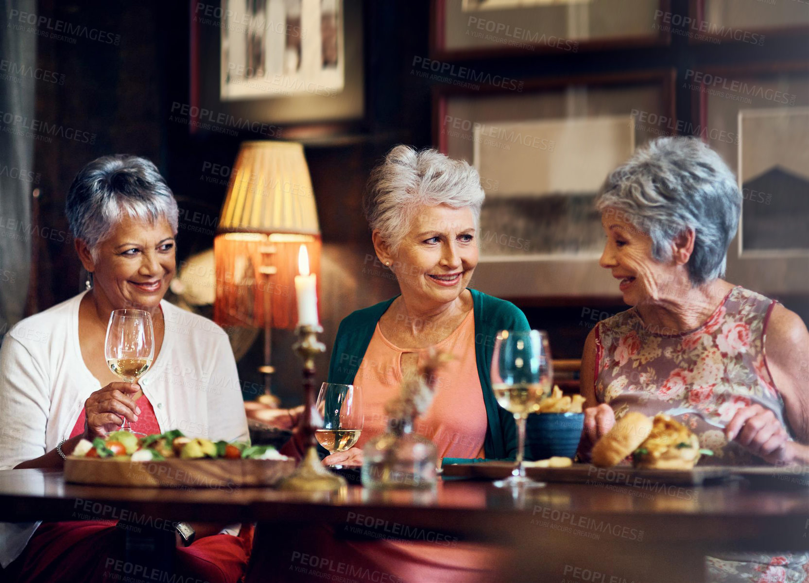 Buy stock photo Senior woman, friends and food in restaurant for wine, vacation and retirement together with happy. Elderly people, reunion and relax in diner for drinks, holiday and social celebration with memory