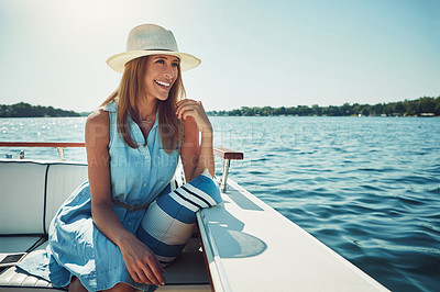 Buy stock photo Relax, ocean and woman by boat for travel, vacation or holiday with summer adventure in Greece. Smile, tourist and female person sitting on yacht by sea water for tropical weekend trip on island.