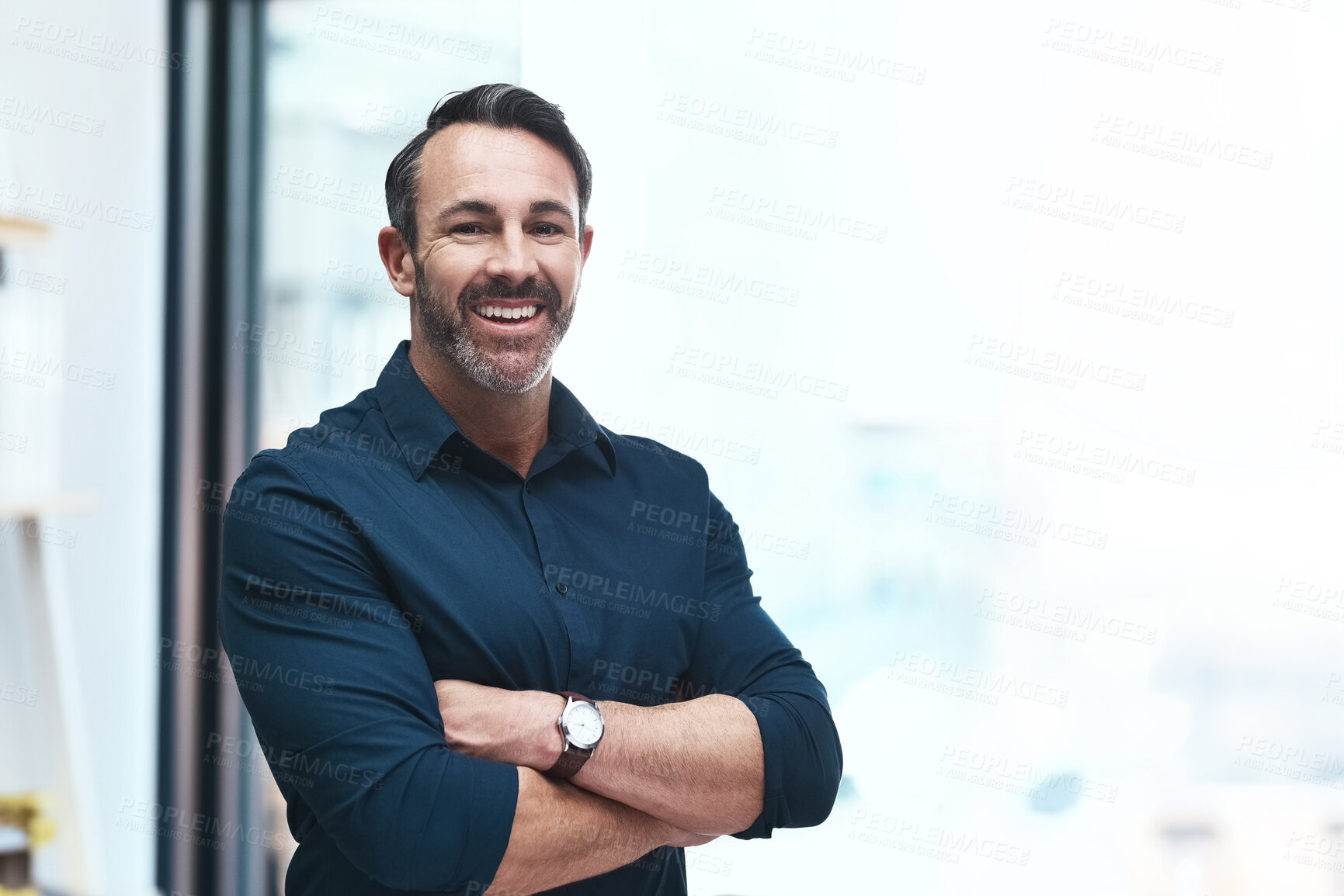 Buy stock photo Portrait of a mature businessman standing in his office