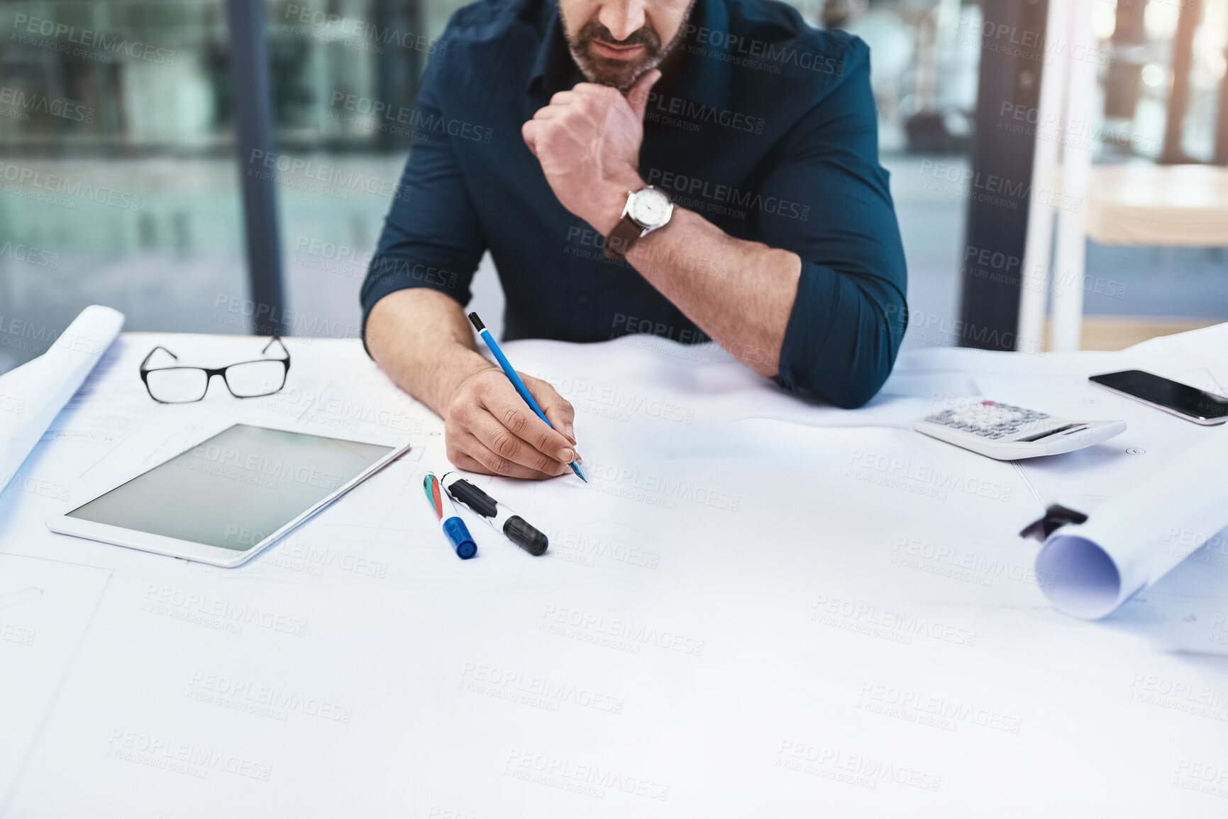 Buy stock photo Cropped shot of an unrecognizable male architect in his office