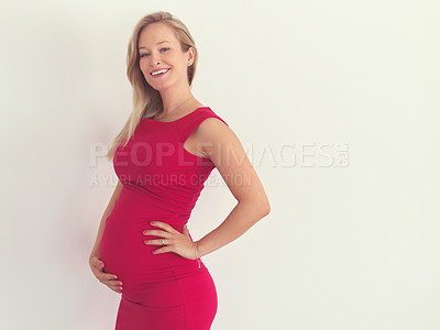 Buy stock photo Studio, happy and pregnant woman in portrait for motherhood, future mama and prenatal care. Pregnancy, girl and touch belly in maternity, healthy abdomen and baby growth by mockup in white background