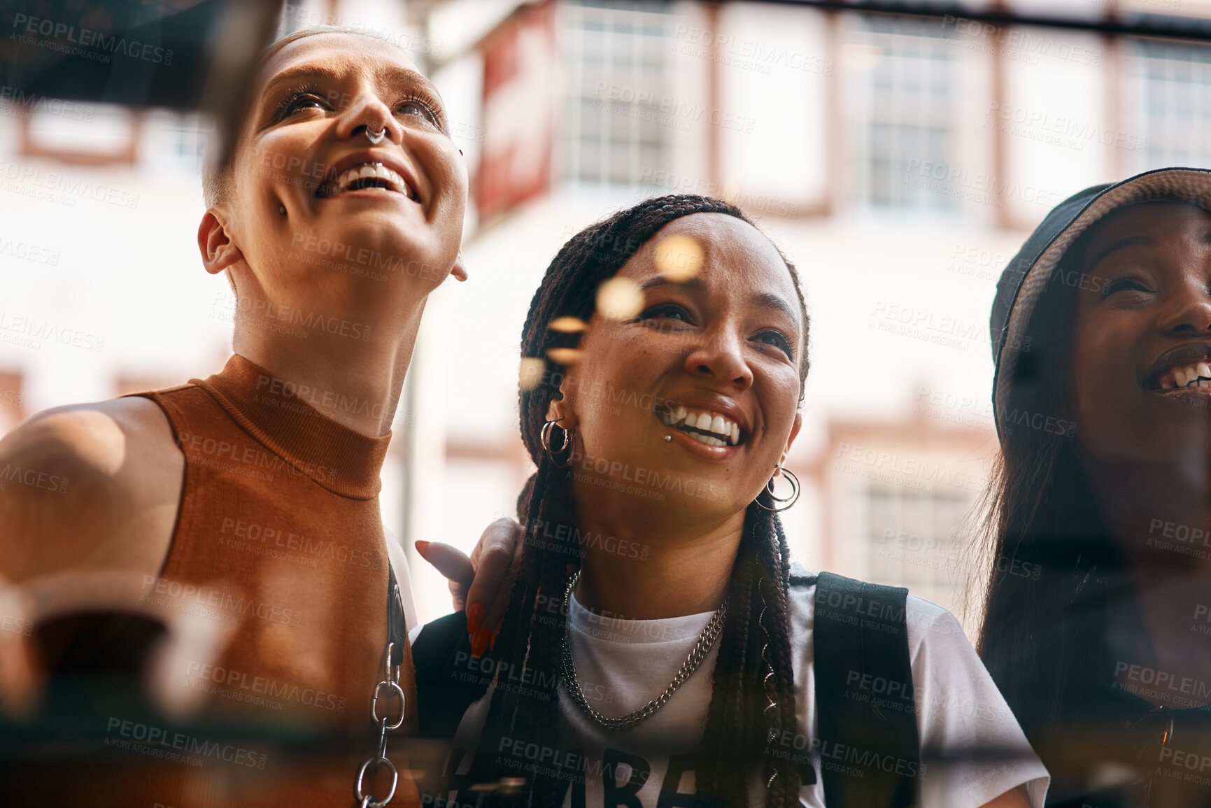 Buy stock photo Cafe, window and group of women with smile, bonding and social lunch in city together. Sidewalk, fun and happy girl friends checking menu choice at restaurant for urban brunch on summer weekend.