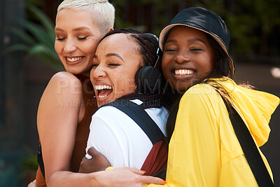 Buy stock photo Friends, girls and hug in city with laughing for bonding, funny joke or streetwear with support outdoor in nature. People, women and happy in town with edgy style, trendy clothes or confident embrace