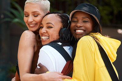 Buy stock photo Friends, girls and embrace in city with laughing for bonding, funny joke or streetwear with support outdoor in nature. People, women and happy in town with edgy style, trendy clothes or confident hug