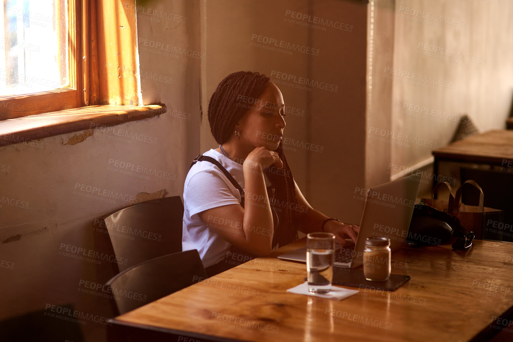 Buy stock photo Woman, typing and reading on laptop in cafe with social media scroll, internet browsing and ebook. Freelancer, copywriter and research with technology for blogging and article planning in coffee shop