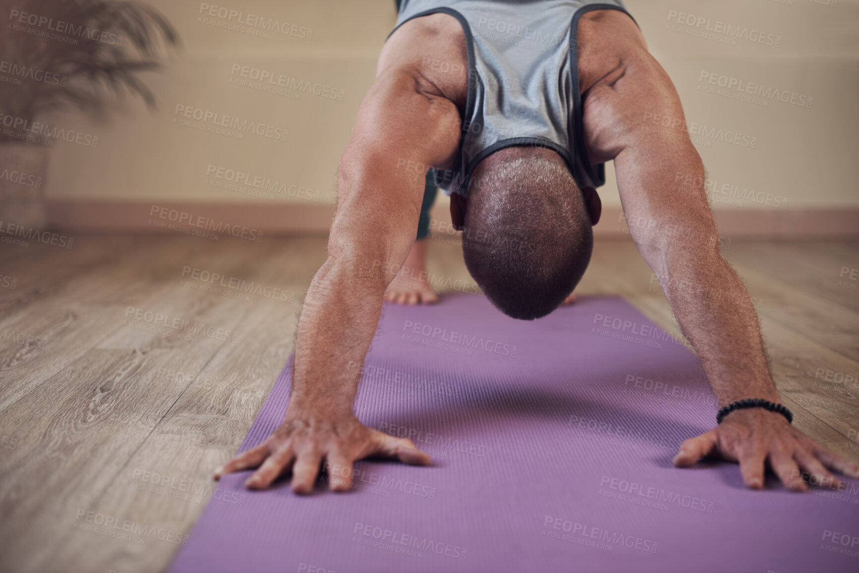 Buy stock photo Man, yoga and downward dog in home for health, wellness and body flexibility for practice routine. Strong, zen yogi and male person in pilates session for mindfulness, wellbeing or balance on mat