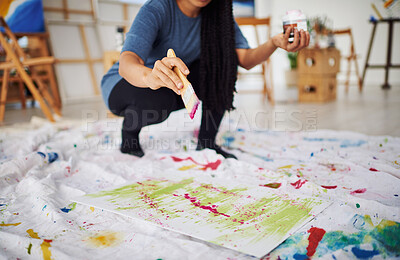 Buy stock photo Floor, mess and hands with brush, painting and artist with supplies for artwork, creative and art. Home, person and watercolor for paper, painter and talent in apartment, palette and inspiration