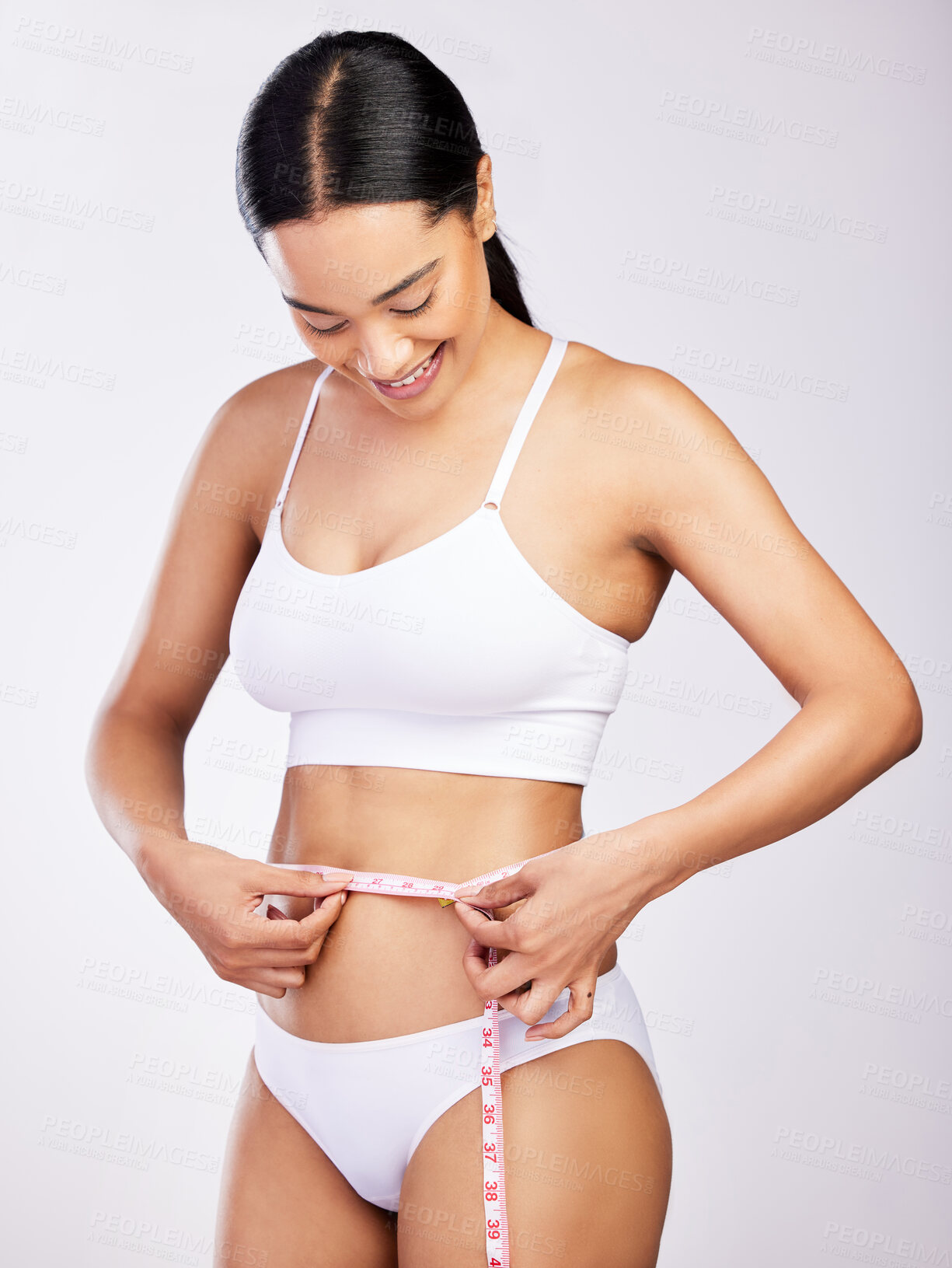 Buy stock photo Diet, model or stomach of happy woman with tape measure for weight loss transformation, fitness or body goals. Health wellness, tummy tuck progress and self care, girl check or liposuction results