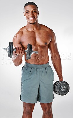 Buy stock photo Portrait, dumbbells and man in studio for fitness, workout and flexing with confidence or smile. Happy, bodybuilder and exercise for muscles, sport and growth or results for arms by white background