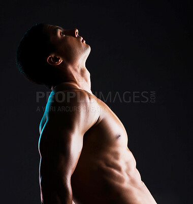 Buy stock photo Man, profile and flex muscle in studio for wellness or body builder, strong and dark for power or strength. Person, thinking and mock up with abs, isolated and black background for aesthetic shadow.