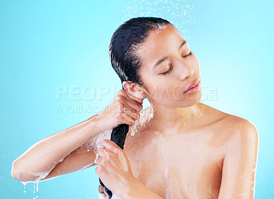 Buy stock photo Shower, shampoo and woman relax with hair care for cleaning benefits on studio background. Girl, bath and water splash foam from conditioner, soap and washing hairstyle with cosmetics for hygiene