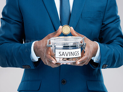 Buy stock photo Businessman, gold coin and savings in jar on studio grey background for crypto currency and financial security. Person, budget and token storage for growing wealth, safe money and investing in future