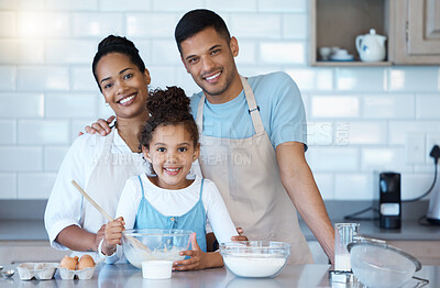 Buy stock photo Portrait, happy family and kid baking in kitchen for bonding with parents together in home. Face, father and mother teaching child cooking food with flour, eggs and support to help girl with dessert