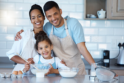 Buy stock photo Portrait, happy family and child baking in kitchen for bonding with parents together in home. Face, father and mother teaching kid cooking food with flour, eggs and support to help girl with dessert