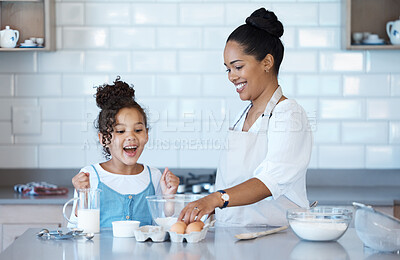 Buy stock photo Learning, excited mother and child baking in kitchen for family bonding, love and care together. Mom, girl and teaching kid cooking food with flour, eggs and sugar to help with dessert recipe in home