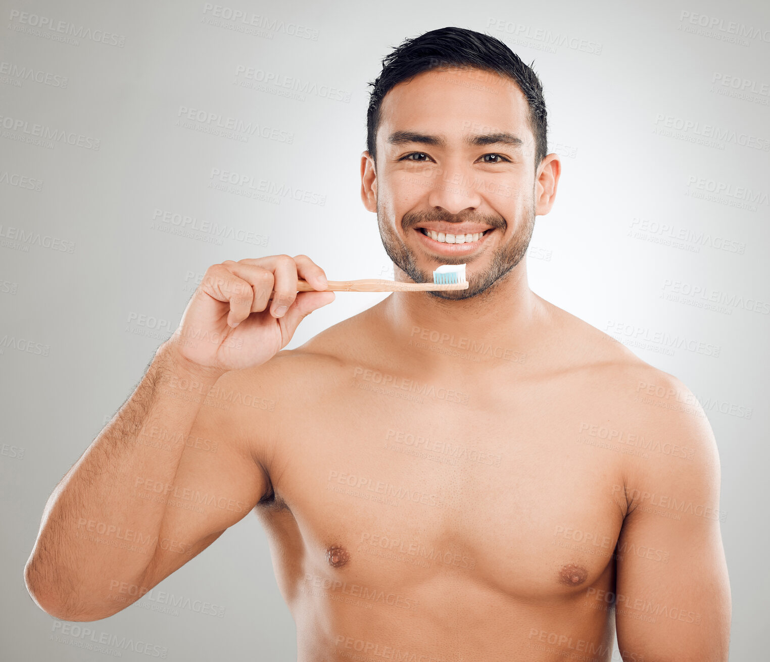 Buy stock photo Man, portrait and toothbrush for brushing teeth in studio, grooming and treatment on gray background. Male person, toothpaste and gum health or tooth whitening, plaque and oral or dental healthcare