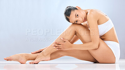 Buy stock photo Studio, skincare and woman in portrait on floor for shaving, grooming or hair removal with pride. Body positivity, female model or beauty by white background for epilation cosmetics, glow or smooth