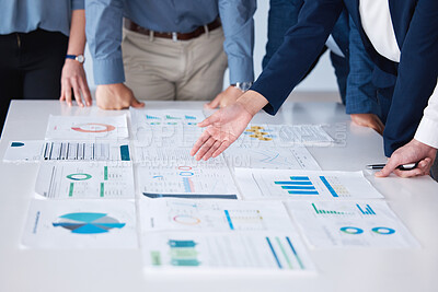 Buy stock photo Meeting, hands and business people with paperwork on table with collaboration and feedback for project review. Teamwork, documents and employee showing analytics for global sales statistics in office