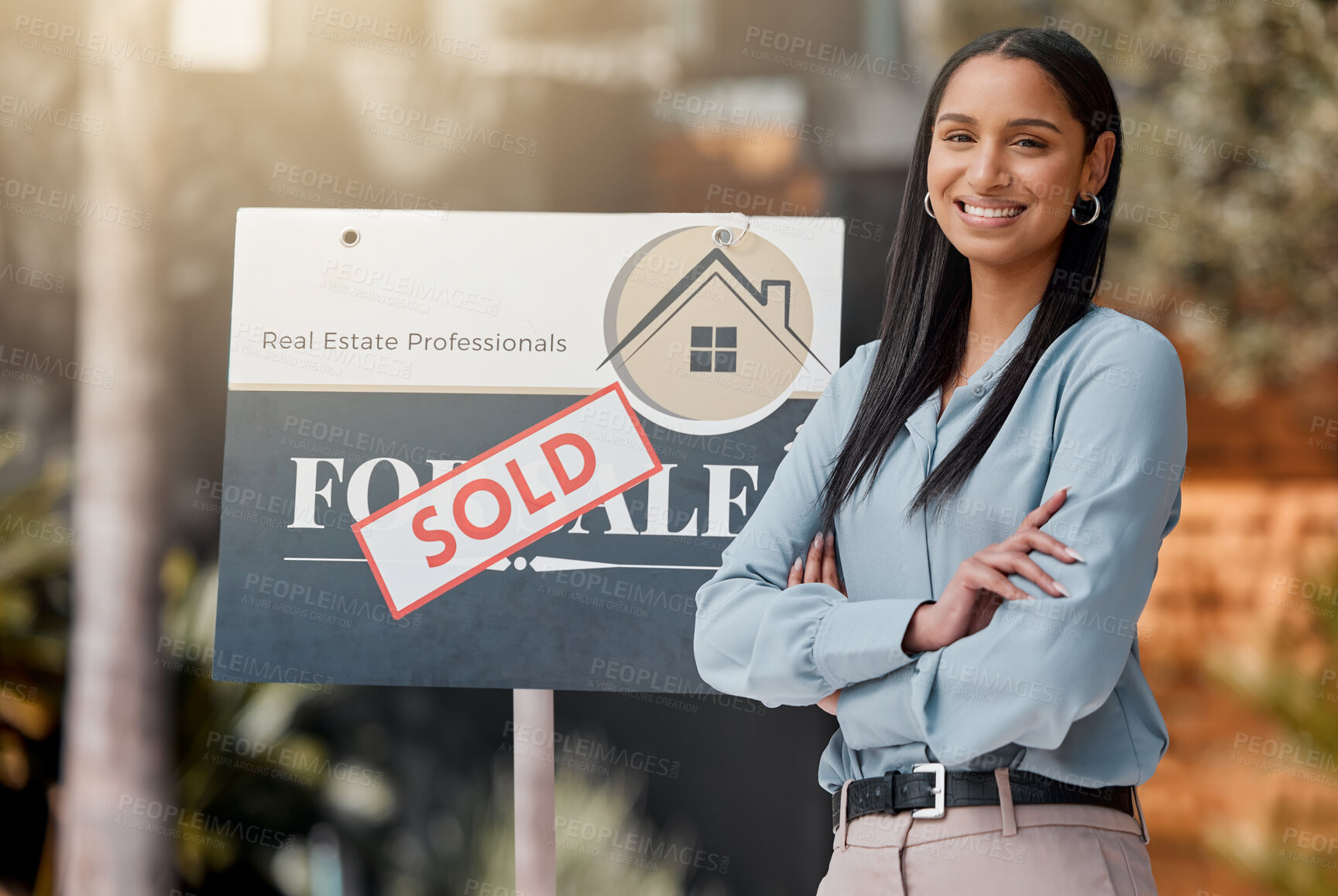 Buy stock photo Arms crossed, sold sign and portrait of realtor woman in garden of home for bond, loan or mortgage. Board, property and sale with real estate agent in neighborhood for finance, growth or investment