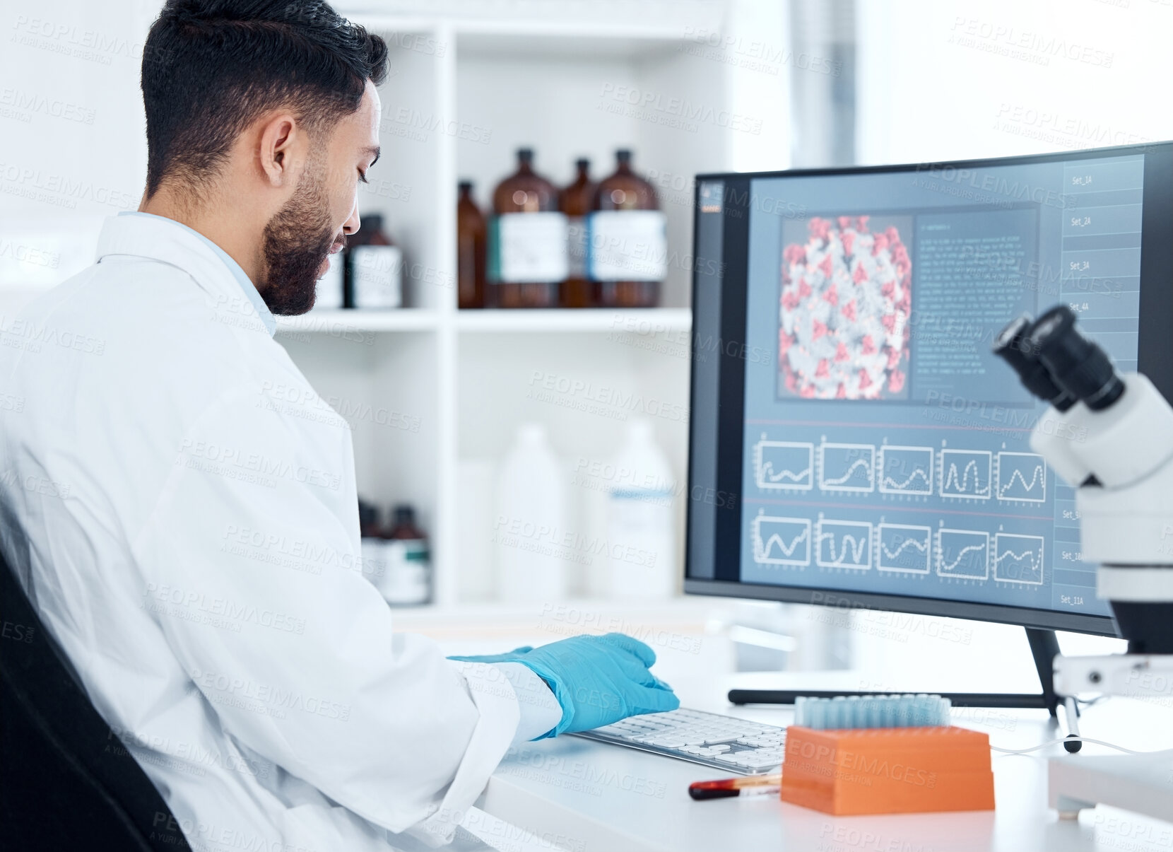 Buy stock photo Screen, computer and man in laboratory for research, science and genetics with ppe at desk. Technology, innovation and doctor for dna, healthcare or career and development in pharmaceutical company