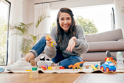 Buy stock photo Pov of baby, portrait and happy woman with toys, playroom and toddler as cheerful parent. Female person, home and child development for motor skills, cognition or behavior for bonding as caregiver