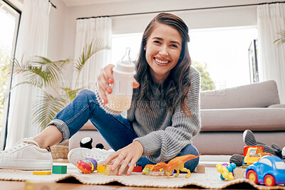 Buy stock photo Pov, mother and happy woman with baby bottle, playroom and toys in cheerful home. Female person, parent and child development for motor skills, cognition or behavior in bonding, care and support