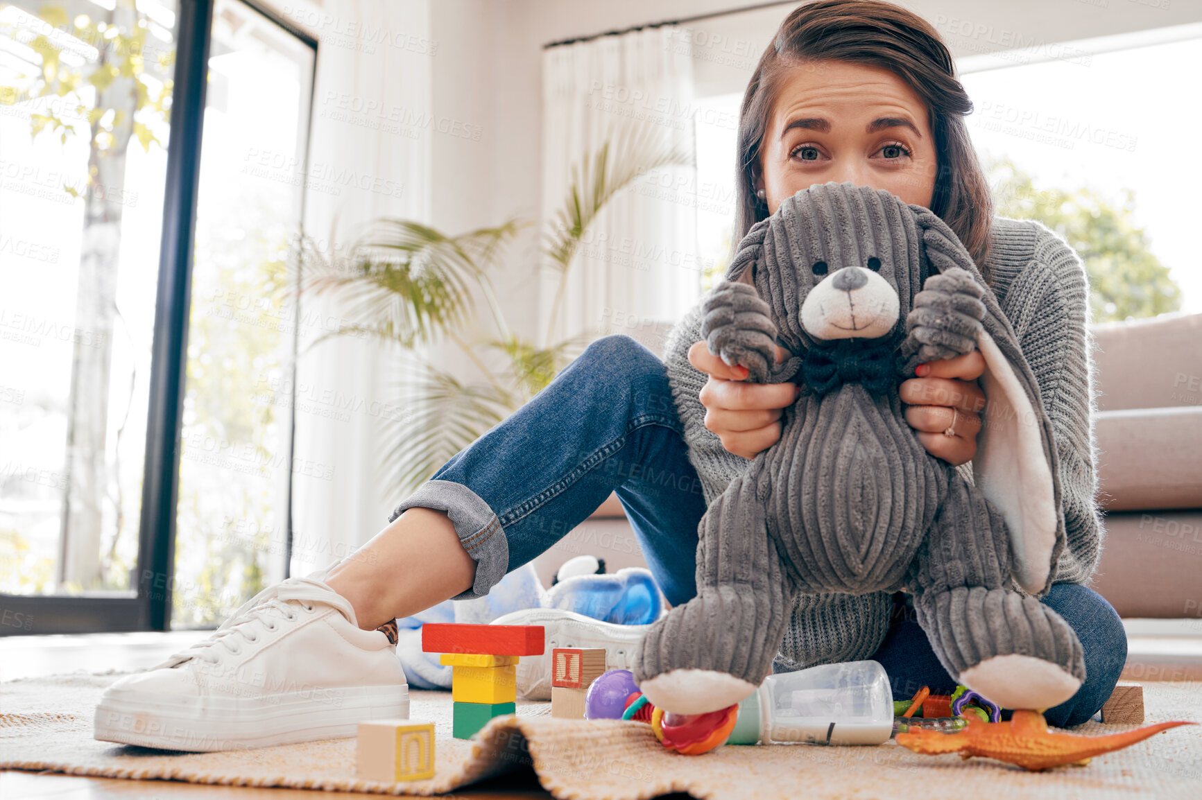 Buy stock photo Pov, portrait and woman with toys, living room and happy for toddler as cheerful parent. Female person, home and child development for motor skills, cognition and behavior with bonding or caregiving