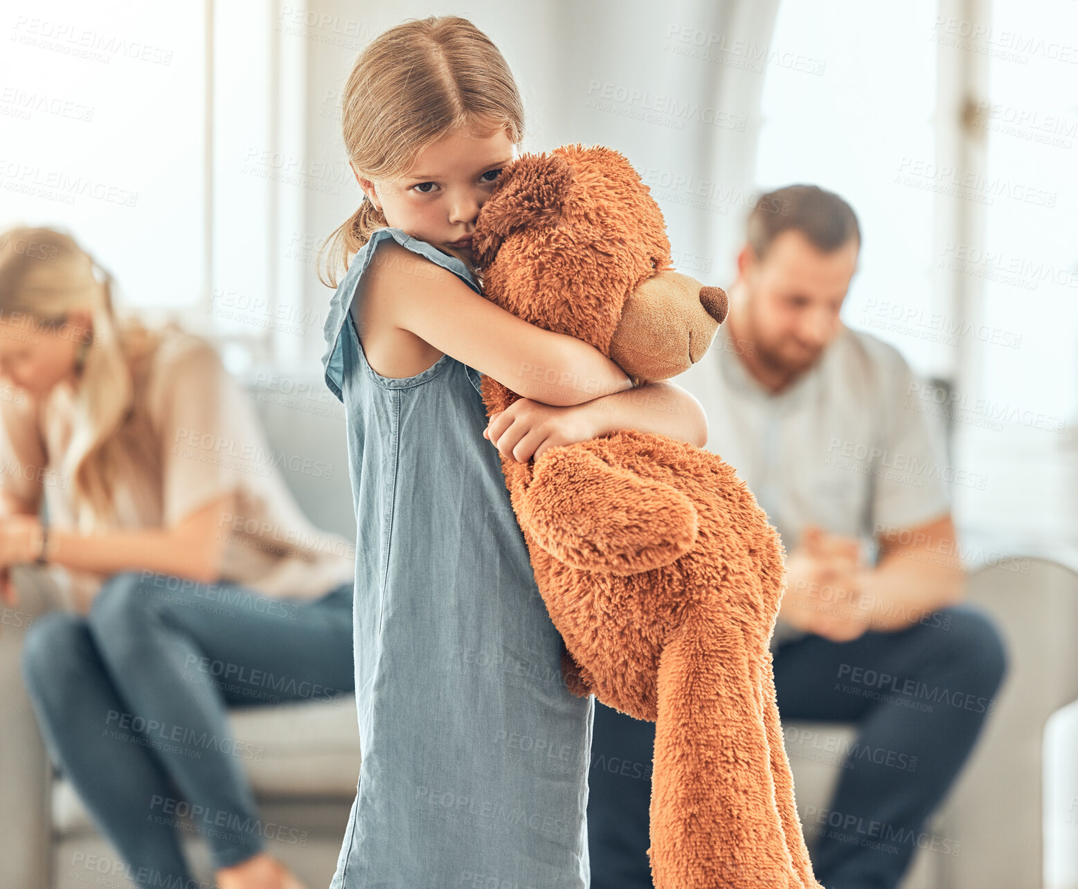 Buy stock photo Child, teddy and parents fighting in home, mental health and sad or depressed for parent separation or divorce. Security toy, comfort and house conflict with emotional distress, mom and dad in lounge
