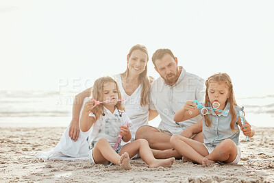 Buy stock photo Happy, bubbles and family in beach for vacation, smile and celebration of adoption of siblings in San Diego. Outdoor, playful and kids blow wand, joy and woman with pride for children with man