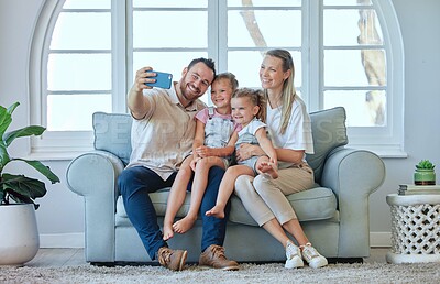 Buy stock photo Love, selfie and family on sofa with support, care and bonding with vacation, holiday or memory. Smile, app and parents with happy children at home for smartphone, photography and profile picture