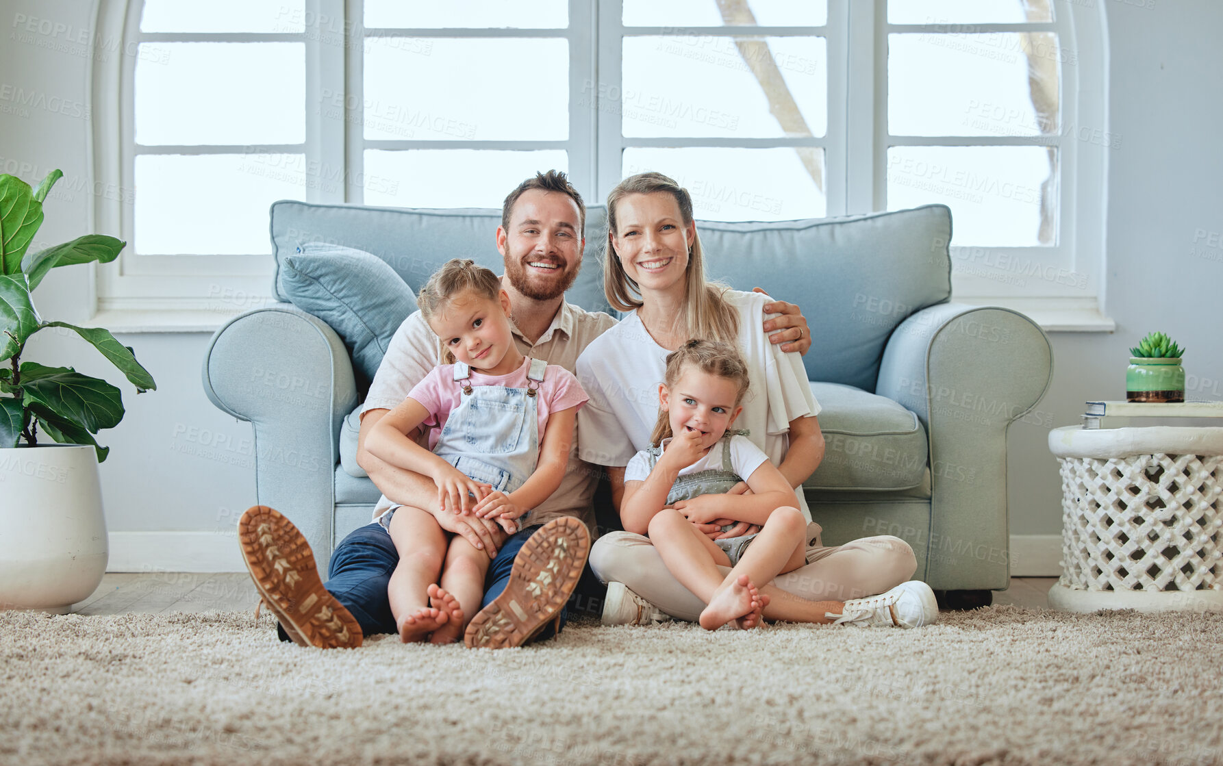 Buy stock photo Family, care and parents with kids in portrait, happiness and together on home living room floor. People, bonding or smile with love, mother and father relax with children in dream home lounge