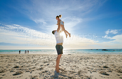 Buy stock photo Beach, man holding girl in air and playful for vacation, weekend break and summer. Father lifting daughter, relax and bonding at seaside, holiday and loving together for time outdoor with happiness