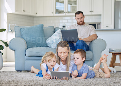 Buy stock photo Mom, parents and kids with tablet on floor for playing, fun and home with digital education for child development. Family, people and happy in living room with online games or cartoon for learning