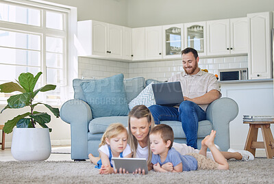 Buy stock photo Happy, parents and kids with toys on floor for playing, fun and bonding with education for child development. Family, people and smile on sofa in living room with games for learning, enjoy and relax