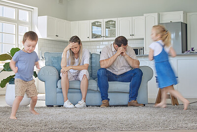 Buy stock photo Children, run and fast with tired parents in home, adhd and mental health with busy siblings in apartment. Living room, people and burnout with headache, sofa and parenthood in chaotic house