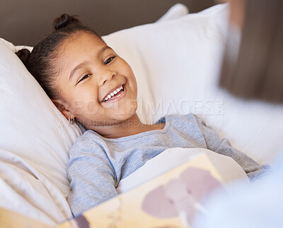 Buy stock photo Mother, girl and reading book for storytelling in bedroom, language and literature for learning at bedtime. Mommy, daughter and listening for child development, fiction education and love in home