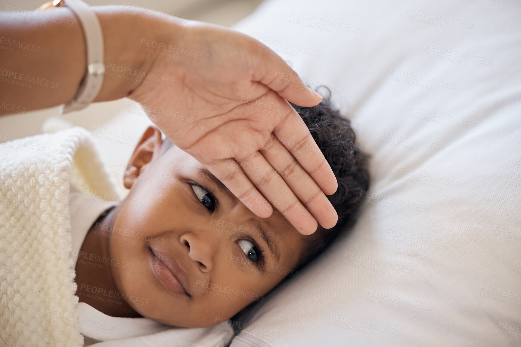 Buy stock photo Hands, mom and forehead check for sick child in bed for fever, risk or influenza, worry or virus in their home together. Love, parenting or mother feeling sad kid in bedroom with infection or illness