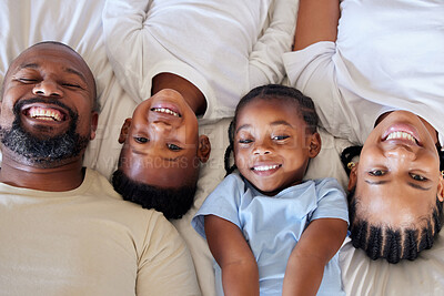 Buy stock photo Top view, portrait and happy family on bed for relax, comfort and love or support in new home. Mom, dad and children with peace, calm and together in apartment or house for vacation or weekend 