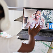 Distance learning with zoom. African american female teacher on a ...