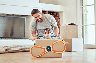 Buy stock photo Father, children and house with cardboard airplane for playing, happiness and bonding in new family home. Dad, siblings and push box in living room for fun or energy, growth and development with kids