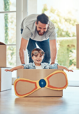 Buy stock photo Dad, children and house with cardboard airplane for playing, happiness and bonding in new family home. Father, siblings and push box in living room for fun or energy, growth and development with kids