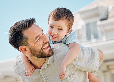 Buy stock photo Happy, man and piggyback son outdoor for love, bonding hug and playful interaction of support at house. Smile, father and child with embrace for family security in backyard for childhood memory