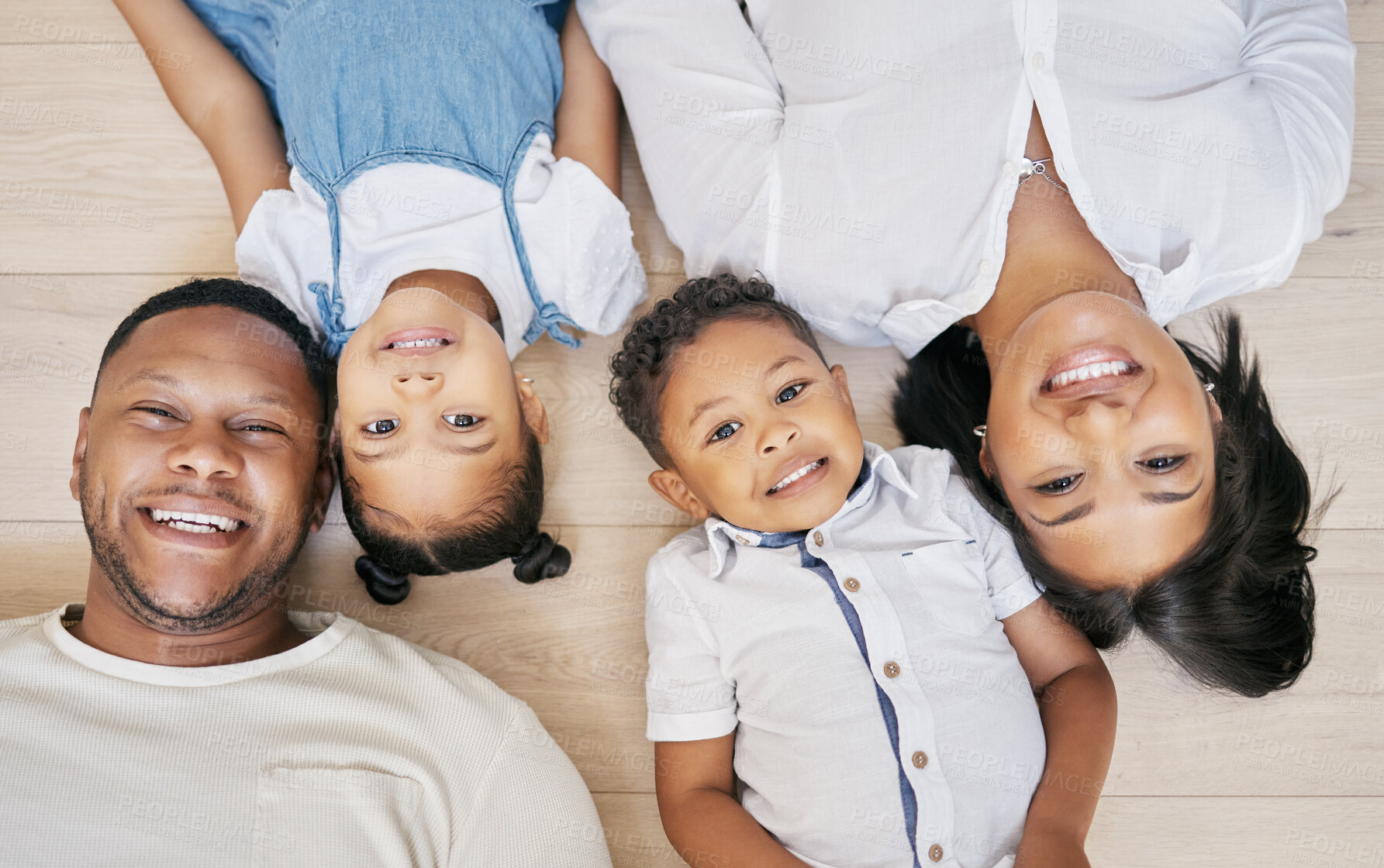 Buy stock photo Family, above portrait and children on floor in living room for bonding, relationship or relax together. Top view, young kids and man parent with woman for care, love or happiness in home on weekend